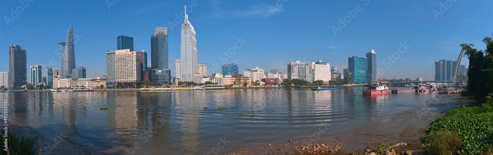 Landscape photo: View of buildings located on the Saigon River. Time: March 13, 2022. Location: Ho Chi Minh city Landscape photo: View of buildings located on the Saigon River. Time: March 13, 2022. Location: Ho Chi Minh city