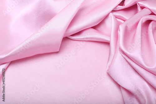 Pink pearl wave fabric silk. Abstract texture horizontal copy space background.