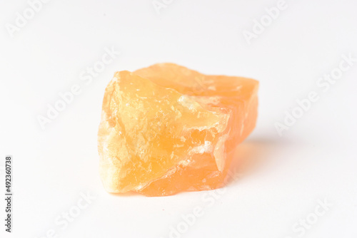 corundum stone on a white background. yellow.