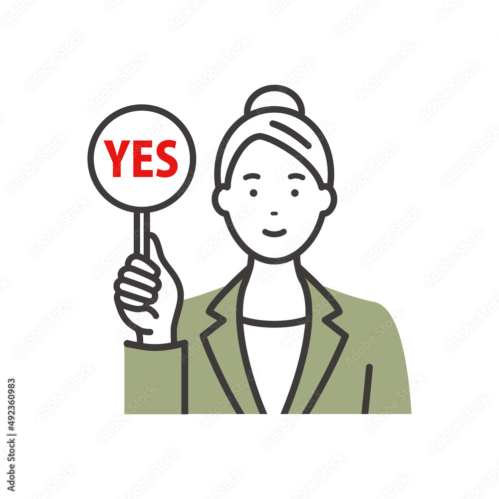 回答札(YES)を持つ若いビジネスウーマン 回答札(YES)を持つ若いビジネスウーマン