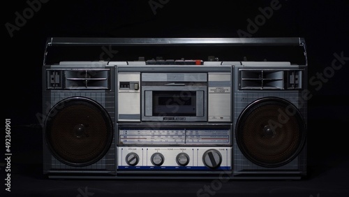 Old vintage cassette microphone on a black background. Retro and vintage concept