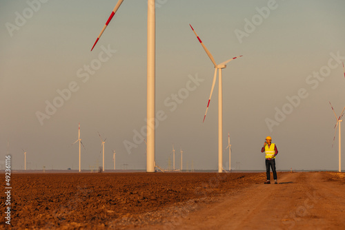 Male engineer in wind turbine power generator station