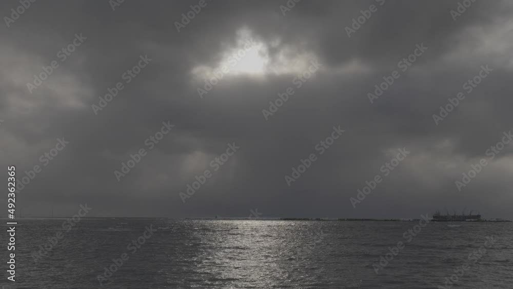 View on the sea and sky before the rain. Dark water and gray overcasted sky. Moody depressive seascape View on the sea and sky before the rain. Dark water and gray overcasted sky. Moody depressive seascape