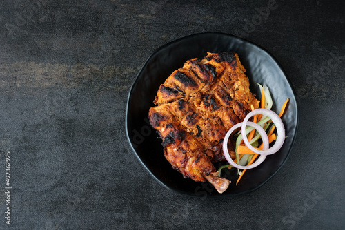 Arabian grilled chicken also called Al Faham or Alfaham or Djaj very popular recipe in Middle East. made using mix Bezar spices and barbeque in a charcoal grill or in oven.