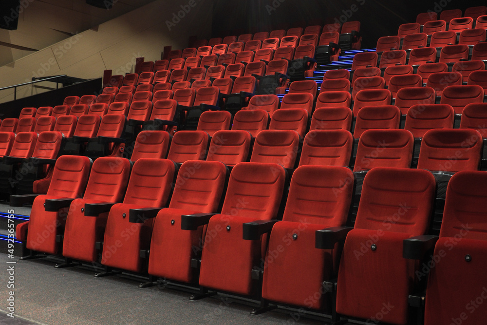 Naklejka premium Rows of empty chairs in a cinema or theater ...