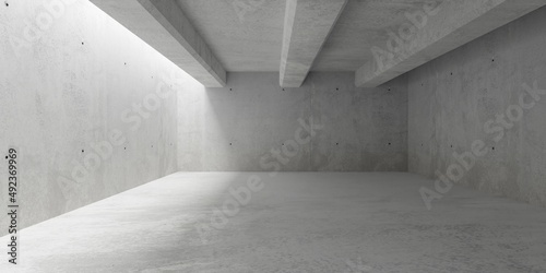 Abstract empty, modern concrete walls room with top light from left and ceiling beams from front to back - industrial interior background template