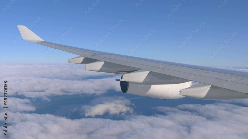 Airplane flight above the clouds in 4K Airplane flight above the clouds in 4K