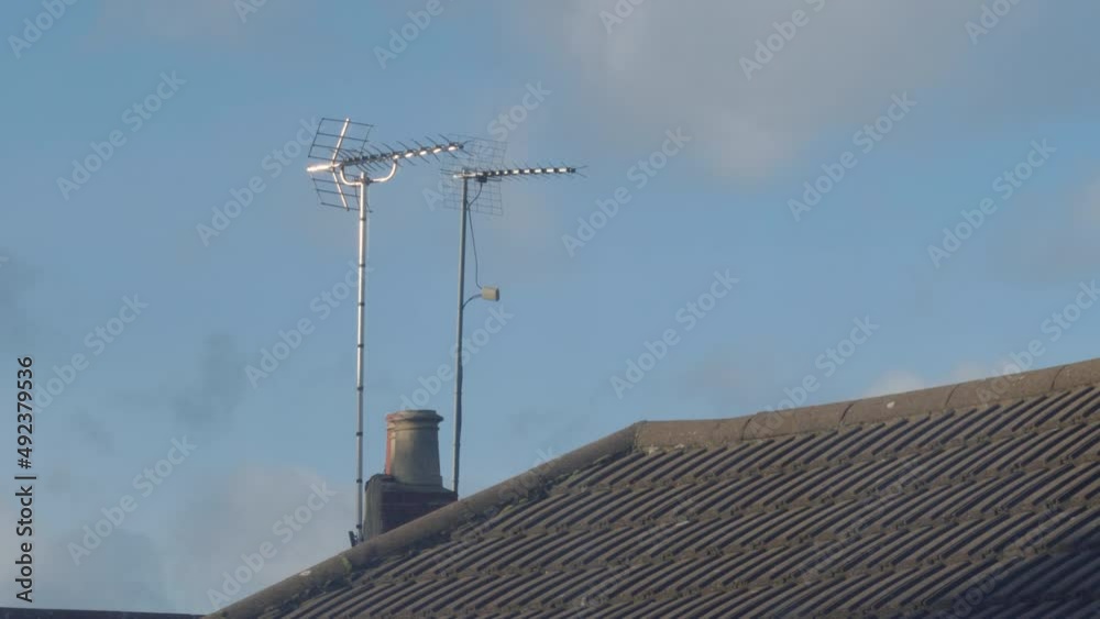 heavy storm wind shakes tv aerial on roof in england uk heavy storm wind shakes tv aerial on roof in england uk