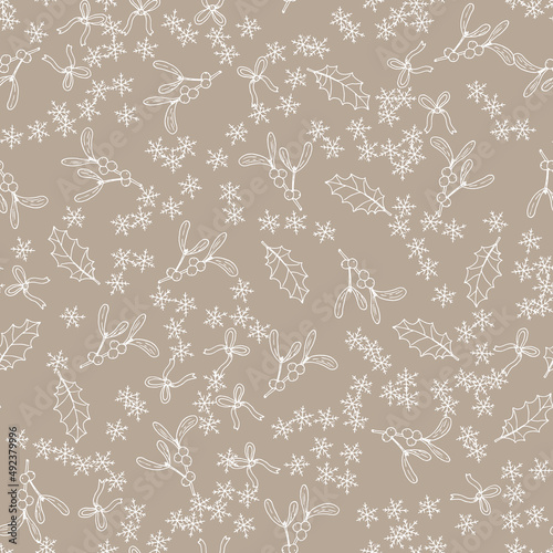 Christmas seamless pattern with holly and mistletoe leaves and berries