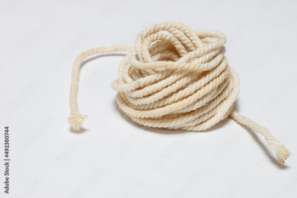 a ball of rope on a white background