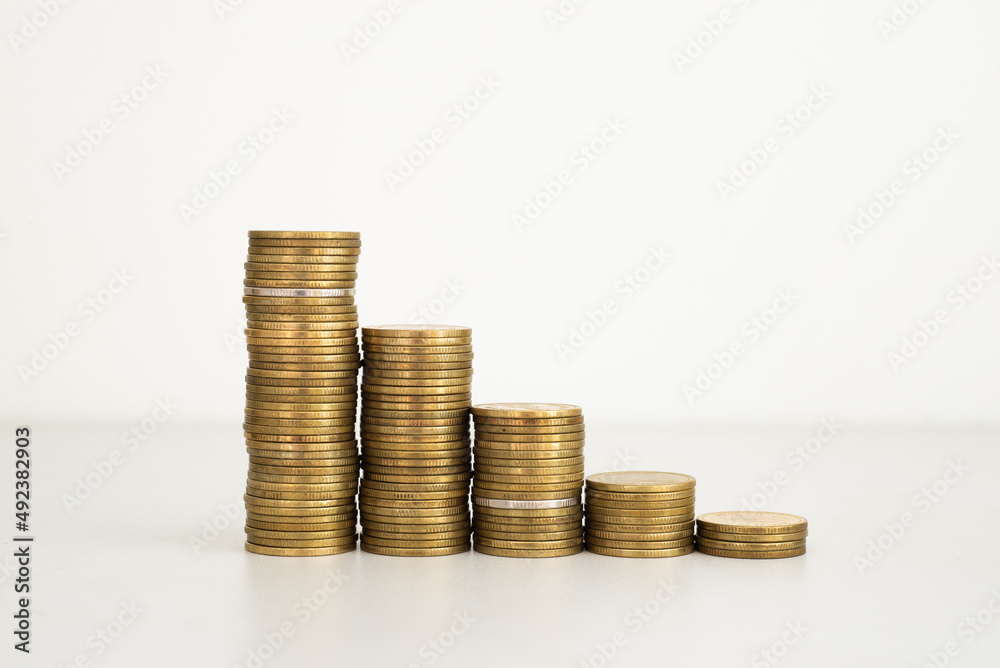 coin stack growth up isolated on white background. money saving, financial grow, business, economy budget and investment concept. coin stack growth up isolated on white background. money saving, financial grow, business, economy budget and investment concept.