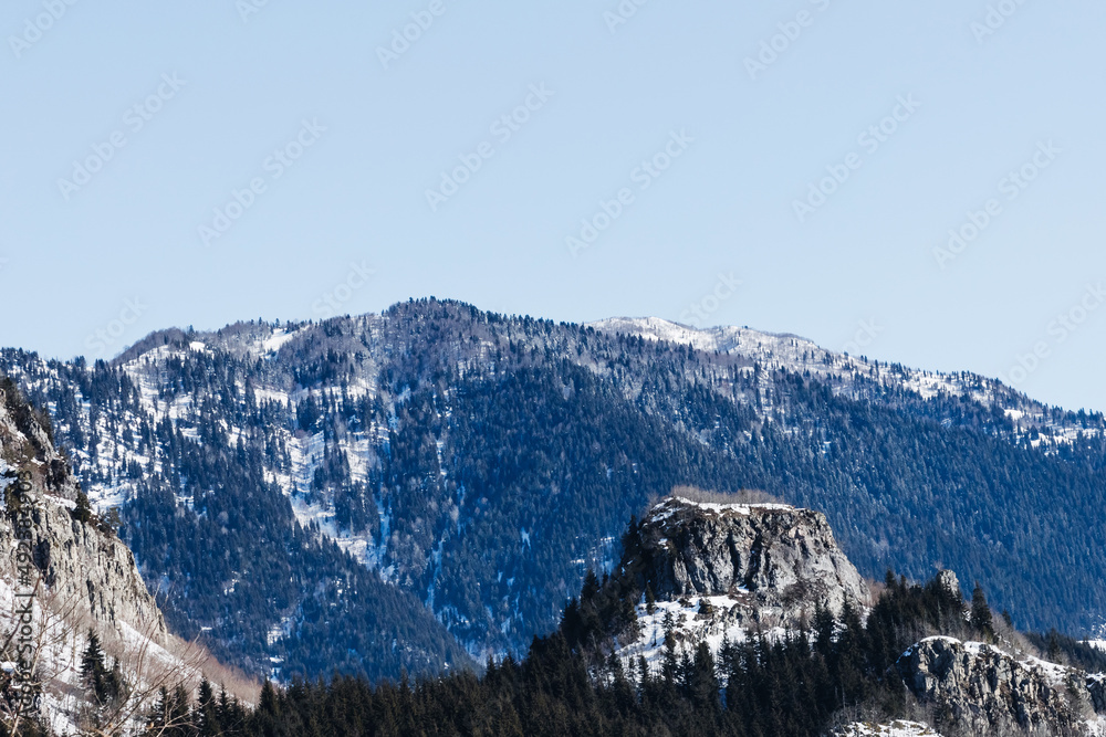  Snowy mountain peaks, large alpine mountains against the blue sky