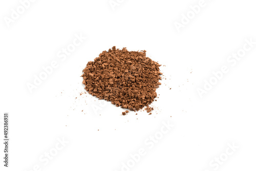 Makeup cosmetics. Eyeshadow in brown color crushed palette, colorful eye shadow powder on white background