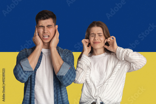 Stop War. Ukrainian Couple Covering Ears Plugging With Fingers