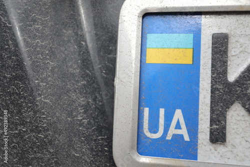 Ukrainian flag on car numbers, during Russian war invasion.