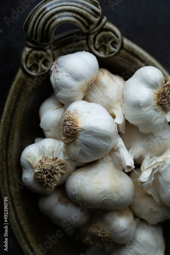 Group of Garlic Bulbs in a Bowl