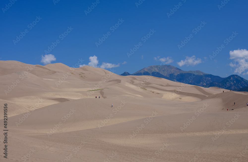 Tourists on the Great Sand Dunes in Colorado