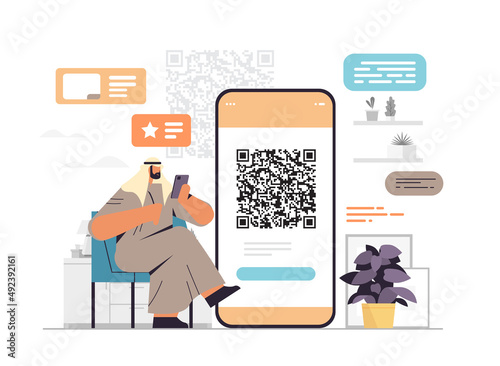 arab man holding smartphone businessman scanning qr code in online mobile app horizontal full length