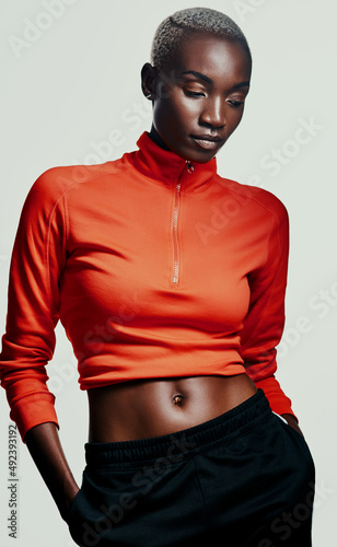 Workout wear done right. Studio shot of an attractive young woman in sportswear against a grey background.