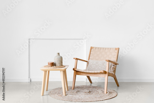 Modern table and chair in interior of light room