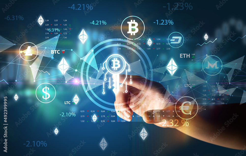 Business person hand pushing currency symbol on multimedia touch screen