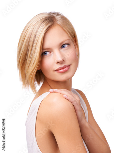 Taking seductive measures. Studio shot of a gorgeous young blond woman.