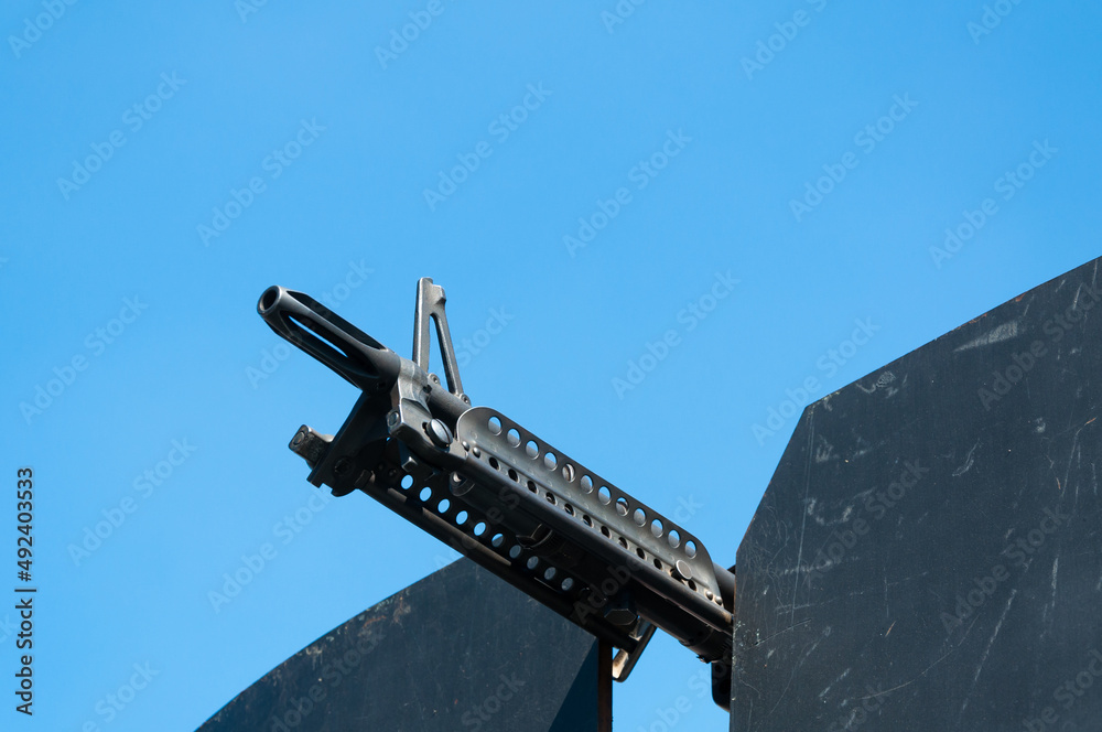 View From Machine Gun Gun weapons close-up ,machine gun on blue sky,Machine gun on a military ...
