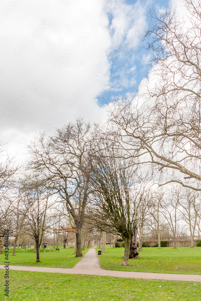 Obraz premium London, United Kingdom, 12 March 2022: Trees in West Ham Park in Newham, East London