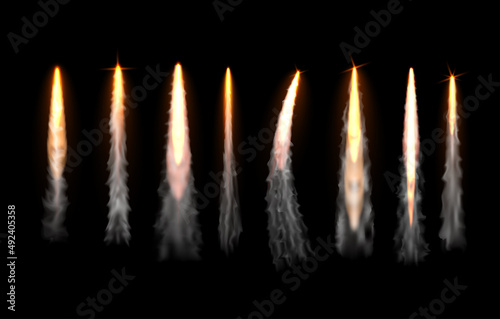 Realistic vertical fire and smoke rocket trails collection vector illustration
