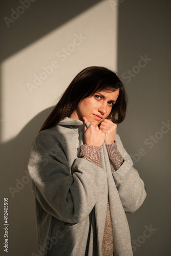 girl in a gray coat stands with his back
portrait young beautiful brunette standing sunlight long straight hair eyes brown long eyelashes girl smiling dreams
