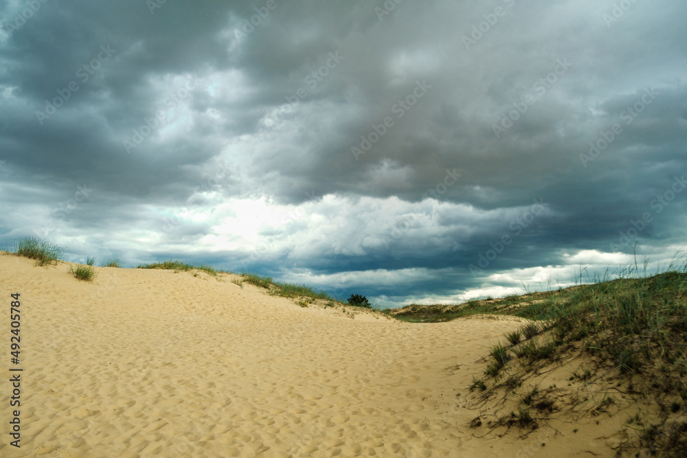 Storm clouds in a desert.