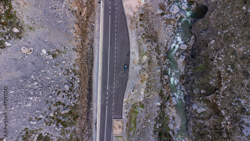 Top down aerial shot of a road and a car in the Kourtaliotiko gorge in Crete, Greece