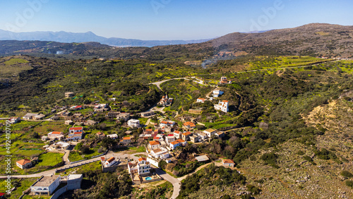 Aerial shot of a town and landscape in Crete, Greece
