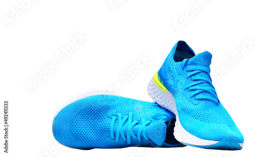 blue runnung or sport shoes on isolated white background photo