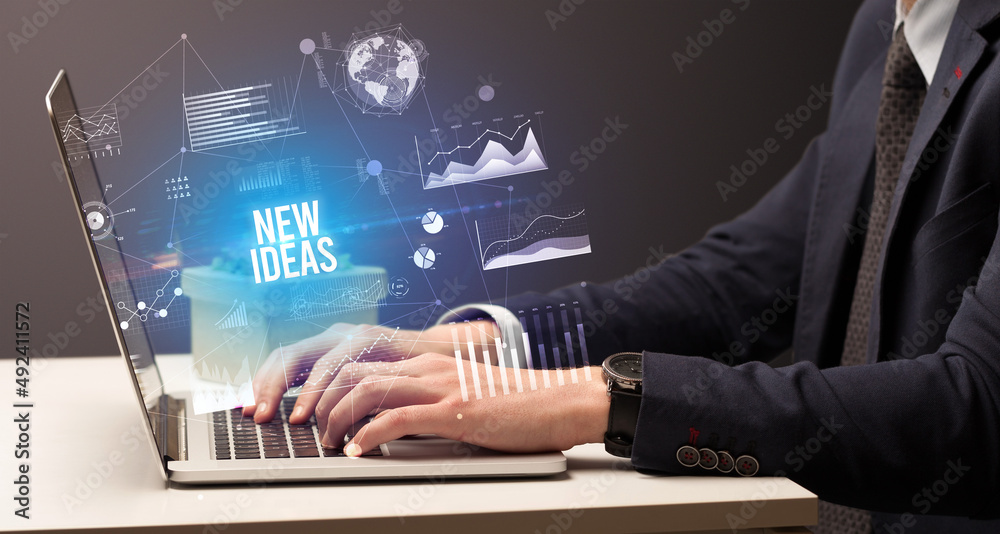 Businessman working on laptop, business concept Businessman working on laptop, business concept