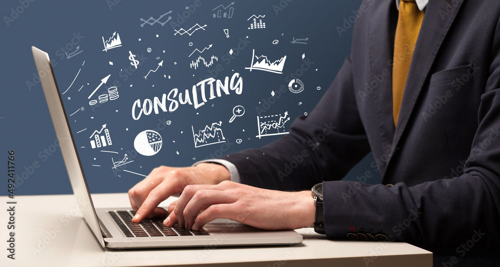 Businessman working on laptop, business concept