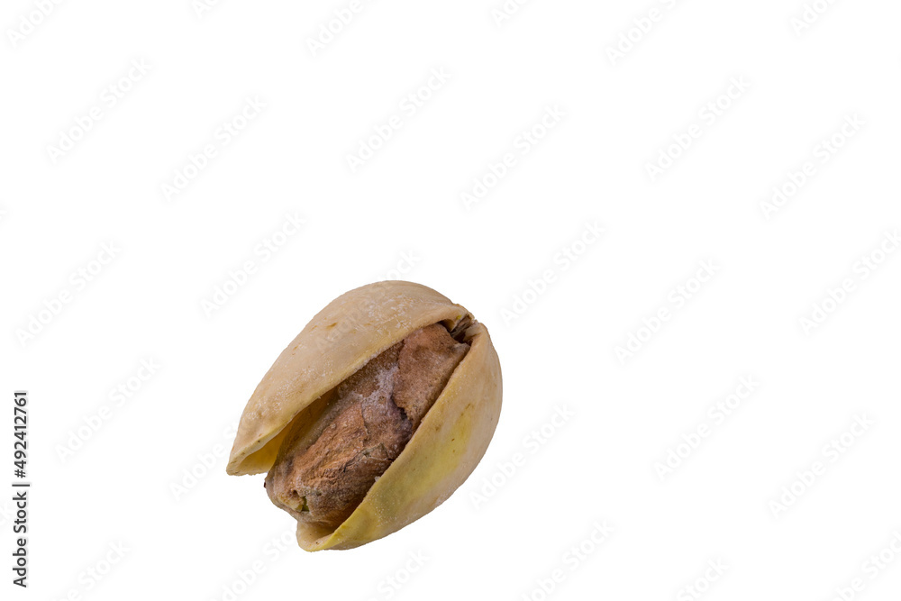 Macro view of pistachio nut isolated on white background. Macro view of pistachio nut isolated on white background.