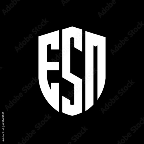 ESM letter logo design. ESM modern letter logo with black background. ESM creative  letter logo. simple and modern letter logo. vector logo modern alphabet font overlap style. Initial letters ESM  photo