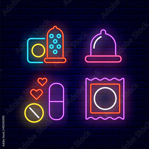 Condom neon icons set. Erection pills symbols. Outer glowing effect logotype on brick wall. Vector illustration