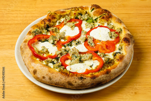 pizza with peppers and sausage
