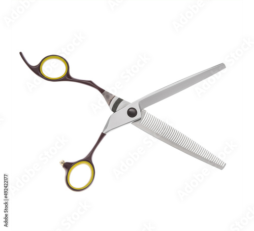 Scissors for cutting people and pets. Grooming scissors. Opened scissors on a white isolated background. Side view.