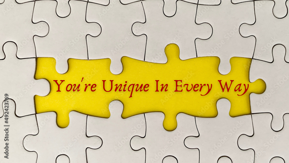 Motivational and inspirational quote on missing jigsaw puzzle - You're unique in every way. Motivational and inspirational quote on missing jigsaw puzzle - You're unique in every way.