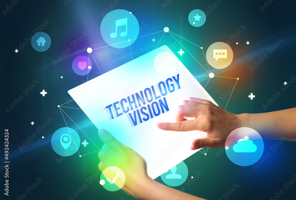 Holding futuristic tablet, new media concept Holding futuristic tablet, new media concept