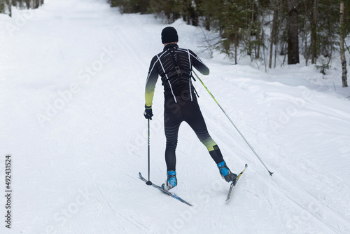 Cross country Skilling. A skier goes skiing on the ski track. © Александр Поташев