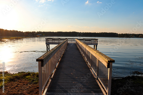 Wallpaper Mural Watching the sunset from the pier at the lake. Torontodigital.ca