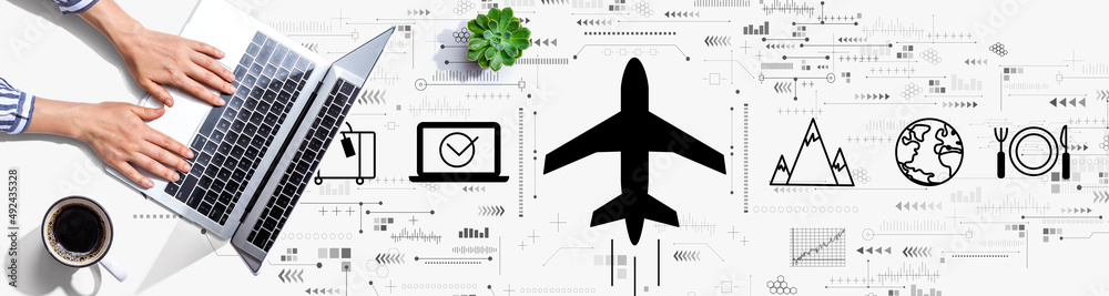 Flight ticket booking concept with person using a laptop computer Flight ticket booking concept with person using a laptop computer
