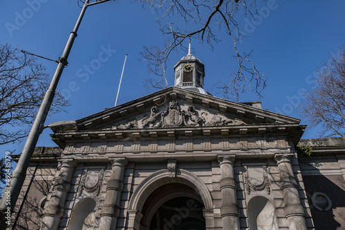 Muiderpoort (1770) in Amsterdam is old city gate on the Alexanderplein, gate was part of the fortifications of Amsterdam. Muiderpoort is a national monument. Amsterdam, Netherlands. photo