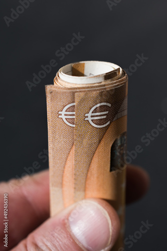 The concept of cash payment. Paper money in hand.