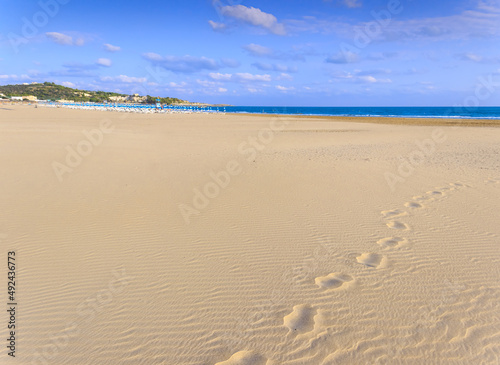 Footprints on the beach. The most beautiful beaches of Puglia  Italy  San Lorenzo Beach in Vieste. Gargano coast  Bay of Vieste   Apulia  Italy.