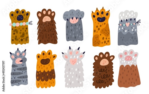 Cat paws. Cute little pets icons. Sweet animals extremity. Different colors and breeds, spotted, striped and fluffy kittens legs. Furry mammals feet with claws. Vector feline limbs set